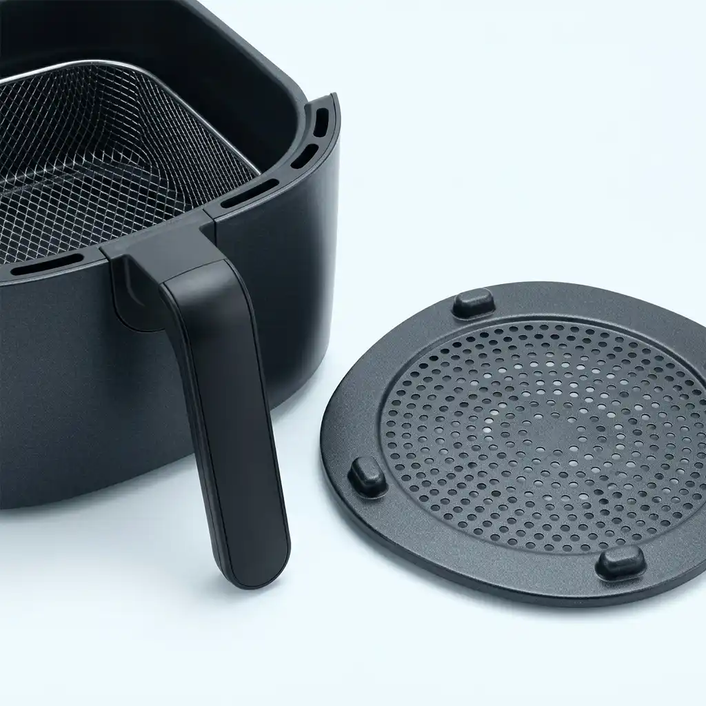 Instant Vortex Plus 6 quart air fryer close-up of the nonstick air fryer basket and crisping tray