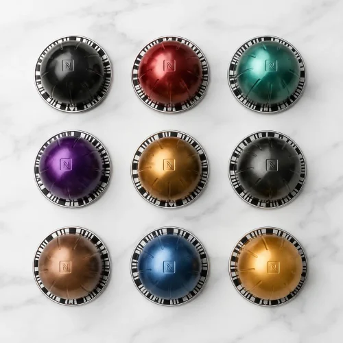 Nespresso capsules on marble surface